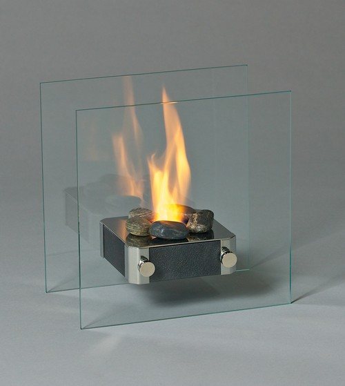 Если устройство должно выполнять исключительно декоративную роль, не менее эффектно будут смотреться небольшие биокамины с компактным огоньком.