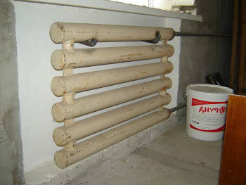 С помощью теплокраски Корунд можно изолировать даже стены за радиаторами